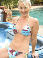 blonde milf does a little skinny dipping in her back yard