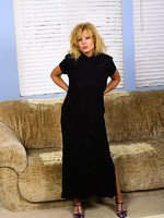 elegant arowyn slips off her black dress and poses in here